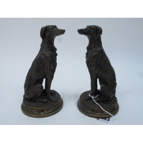 1255 - AFTER F. SOUCHAL (Paris) A Pair of Bronzed Models of Greyhounds, upon circular bases inscribed 