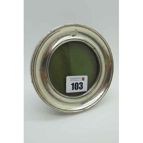 103 - A Hallmarked Silver Mounted Circular Photograph Frame, on wooden easel back.