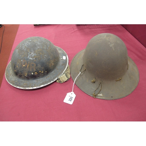 331 - WWII British Civil Defence Helmets, a British Repair Party Brodie Helmet with remnant of original pa... 