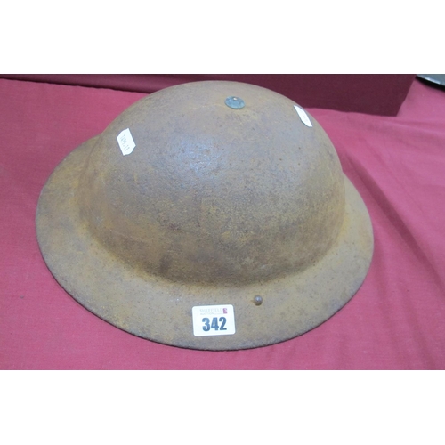 WWII British Brodie Helmet in good relic condition with bales