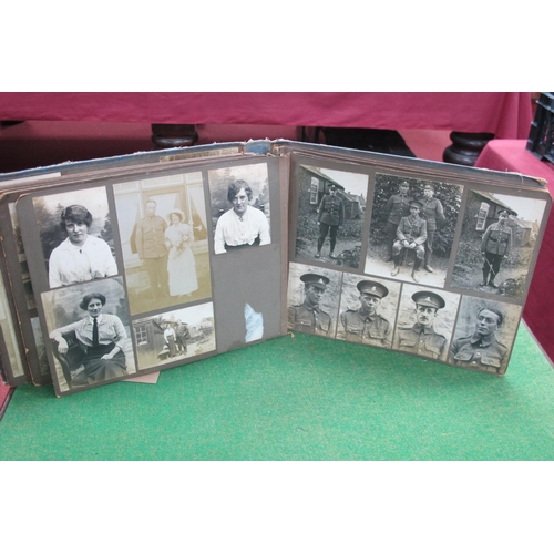 384 - WWI Photograph Album, containing original photographs of civilians, a police officer and soldiers.