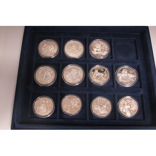 517 - Westminster, The Official China Commemorative Silver Coin Collection, twenty three coins in total, c... 