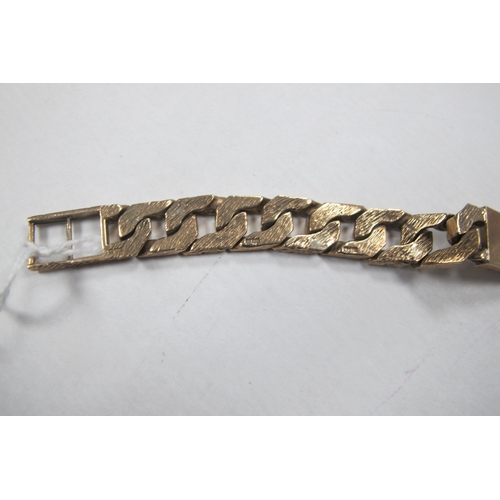 229 - A 9ct Gold Identity Bracelet, composed of polished and textured links, inscribed 