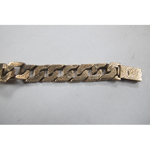 229 - A 9ct Gold Identity Bracelet, composed of polished and textured links, inscribed 