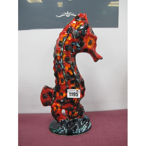 1195 - An Anita Harris Model of a Seahorse, gold signed, 28cm high.