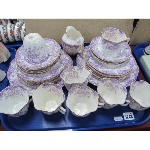 1243 - Wellington China Early XX Century Tea Service, of approximately thirty three pieces, with purple flo... 