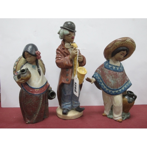 1266 - Lladro Figures of a Mexican Girl and Boy Carrying Ewer's, in matt glaze, another of a clown playing ... 