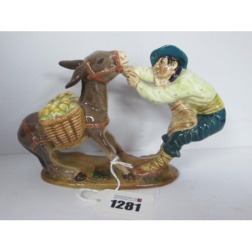 1281 - A Beswick Pottery Figure of Spaniard Pulling Donkey, impressed No 1223.