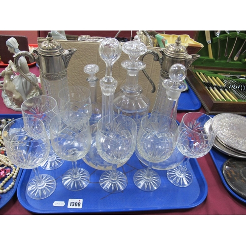 1308 - Two Claret Jugs, four decanters, wine glasses:- One Tray.