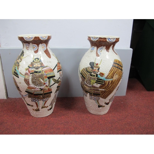 1312 - Oriental - A pair of Japanese pottery vase, circa 1900, each decorated with Samurai Warriors on dimp... 