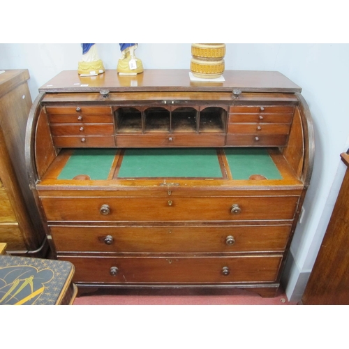 1633 - A XIX Century Mahogany Roll Top Desk, with pigeon hole and drawer interior, over three graduated dra... 