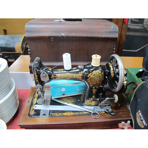 1067 - Jones Hand Sewing Machine, and Astor child's example. (2).