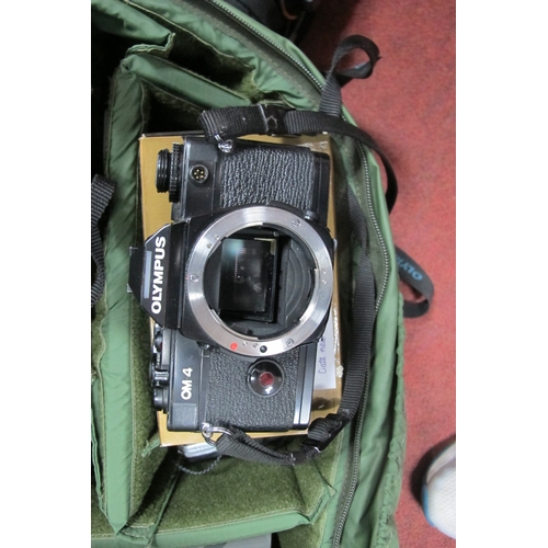 1143 - Cameras: Olympus OM-4 and OM-2, Envoy, Baby Brownie, flashers, Winder 2, filters, etc, in two carry ... 