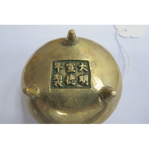 1326 - Oriental - Small Brass Censer, on three feet, with six character marks under base, 4cm high.