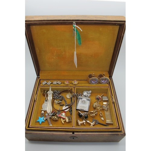 106 - Assorted Cufflinks, pin badges, souvenir page marker, bangle, chain, etc, contained in a leather jew... 