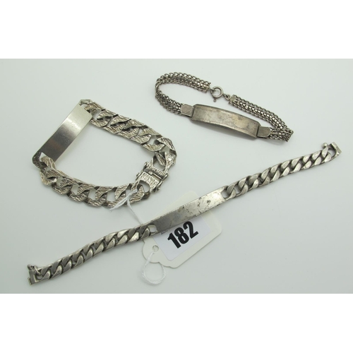 182 - A Hallmarked Silver Curb Link Gent's Identity Bracelet, of textured finish; together with two furthe... 