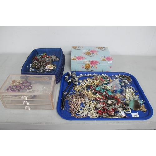 34 - A Mixed Lot of Assorted Costume Jewellery, decorative floral trinket box, trinket drawers, blue bask... 