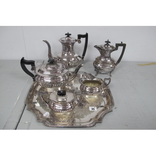 35 - A Plated Four Piece Tea Set, of semi reeded form, together with a decorative plated tray and and a p... 