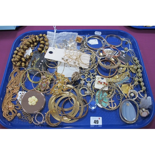 49 - A Selection of Gilt Coloured Costume Jewellery, including necklaces, bangles, hoop earrings, rings, ... 