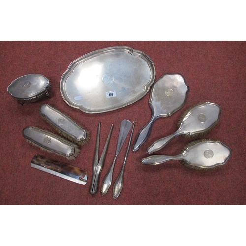 64 - A Matched Hallmarked Silver Dressing Table Set, each piece with engine turned decoration and inscrib... 