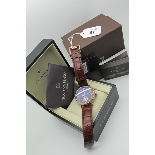 87 - Earnshaw; A Modern Automatic Gent's Wristwatch, the signed brown dial with centre seconds and part v... 