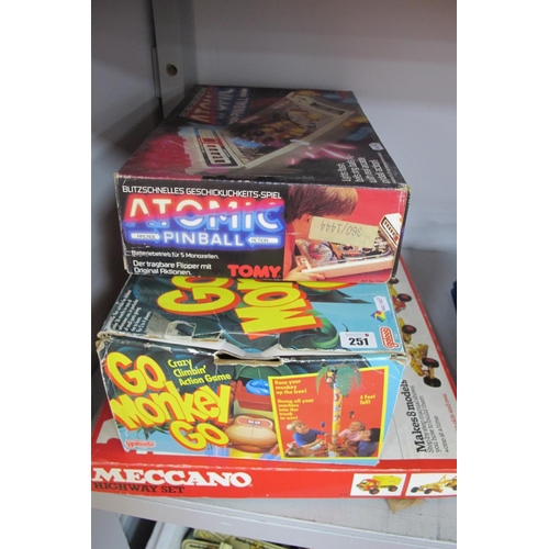 251 - Three Boxed Toys, comprising of Tomy Battery Operated Atomic Pinball (missing battery cover), Galoob... 