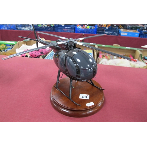 437 - A Desk Top Wooden Construction Model of a Hughes Helicopter G-H500, length 37cm, presented on a wood... 