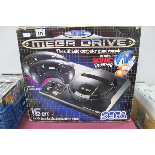 445 - Retro Gaming: A Boxed Sega Mega Drive 16-Bit Games Console, two Mega Drive control pads, untested.