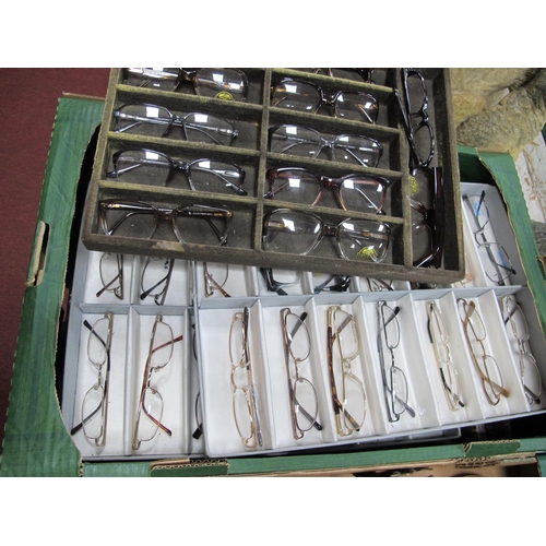 1123 - An Optician's Shop Display, three trays of vintage spectacles (40); plus a mid XX Century testing ki... 