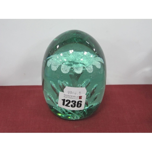 1236 - A XIX Century Glass Dump, with flower head and bubble inclusions 8cm high.