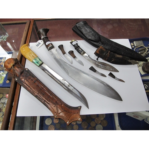 1319 - Middle Eastern Knife, 36.5cm long, in leather sheath. Kukri dagger with two smaller blades in leathe... 