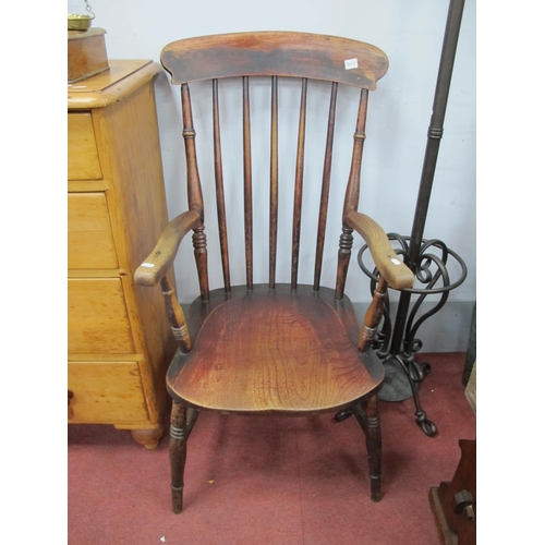 1642 - A XIX Century Ash-Elm Chair, with rail supports shaped on turned legs, united by a 'H' stretcher.