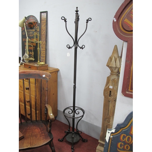 1643 - Cast Metal Coat Stick Stand, with a drip tray, scroll feet.