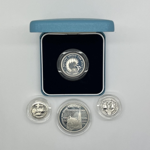 40 - Four Silver Proof Coins, Royal Mint 1995 £2, 1998 Guernsey £1, 1995 Alderney £1 and a 1996 100 Franc... 