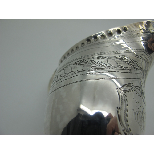 72 - A Georgian Hallmarked Silver Helmet Shape Cream Jug, AB, London 1797, with foliate engraved decorati... 