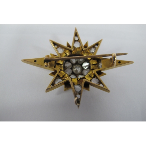 143 - A Victorian Diamond Set Star Brooch, of graduated design set throughout with old and rose cut stones... 