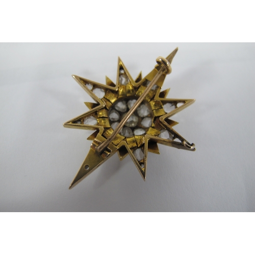 143 - A Victorian Diamond Set Star Brooch, of graduated design set throughout with old and rose cut stones... 