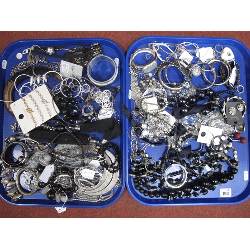 193 - A  Collection of Modern Costume Jewellery, including bangles, bead necklaces, etc :- Two Trays