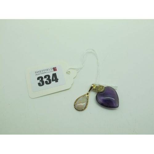 334 - A Modern Heart Shape Polished Hardstone Pendant, stamped 