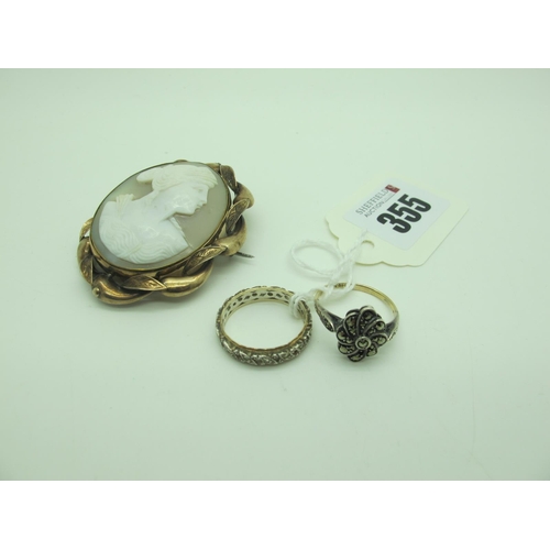 355 - A Marcasite Set Dress Ring, together with an eternity band and an oval shell carved cameo brooch, th... 