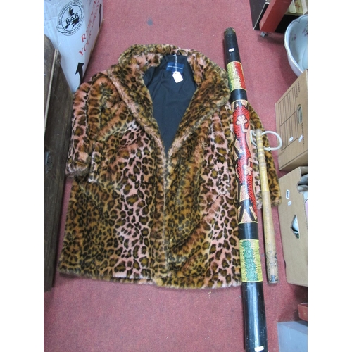 1053 - Didgeridoo, truncheon, French Connection coat. (3).