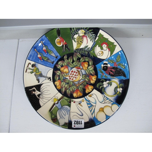 1192 - A Moorcroft Pottery Plate 'The Twelve Days of Christmas', designed by Kerry Goodwin, 785/10, 28cm di... 