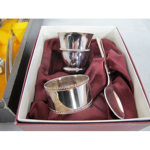 184 - A Decorative Plated Four Piece Tea Set, on twin handled circular plated tray, Modernist style salt a... 