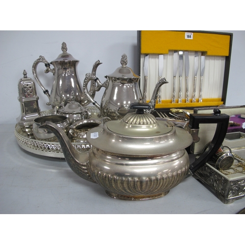 184 - A Decorative Plated Four Piece Tea Set, on twin handled circular plated tray, Modernist style salt a... 