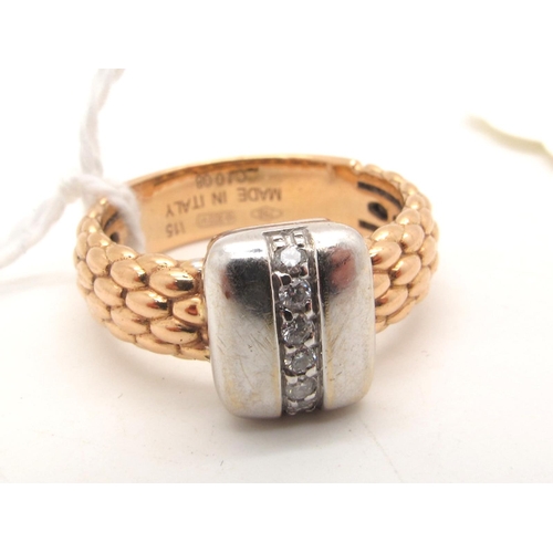 110 - Fope; A Modern Italian Diamond Set Ring, of two tone textured finish, inset with uniform brilliant c... 