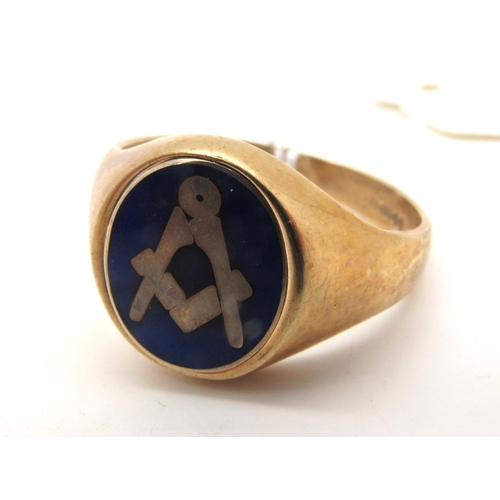 113 - A 9ct Gold Masonic Signet Style Gent's Ring, the swivelling oval panel highlighted in blue enamel, t... 
