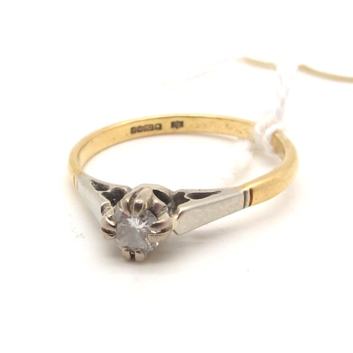 116 - An 18ct Gold Single Stone Diamond Ring, the brilliant cut (chipped) stone claw set, between white sh... 