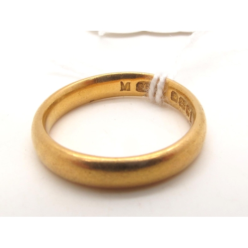121 - A 22ct Gold Plain Wedding Band, (finger size L) (5grams).