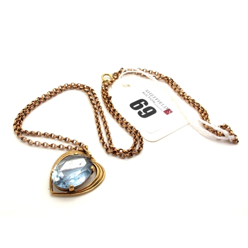 69 - A 9ct Gold Single Stone Pendant, oval four claw set within heart shape setting, on a long chain.