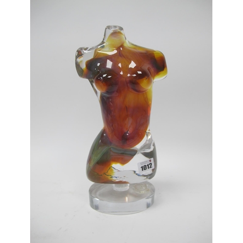 1012 - A Murano Glass Sculpture of a Female Torso, in clear and amber colours, raised on a pedestal oval ba... 